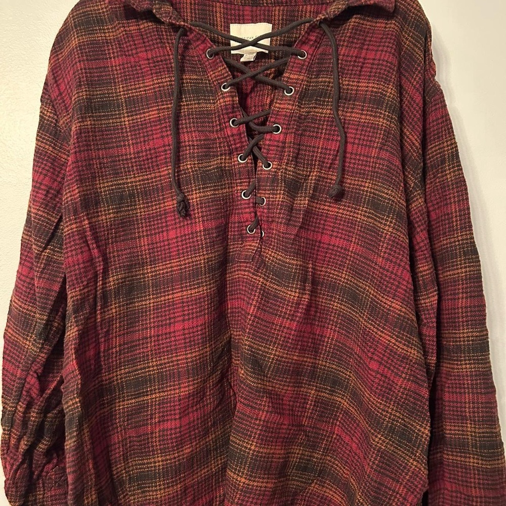 Distressed Plaid Red, Brown, and Black American Eagle Tie Cross Top